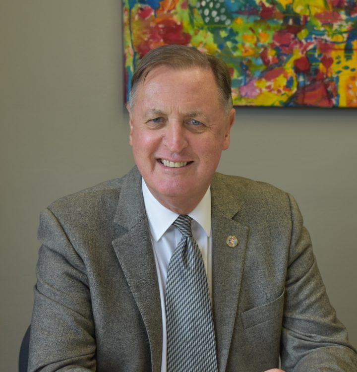 Mr John McCausland
